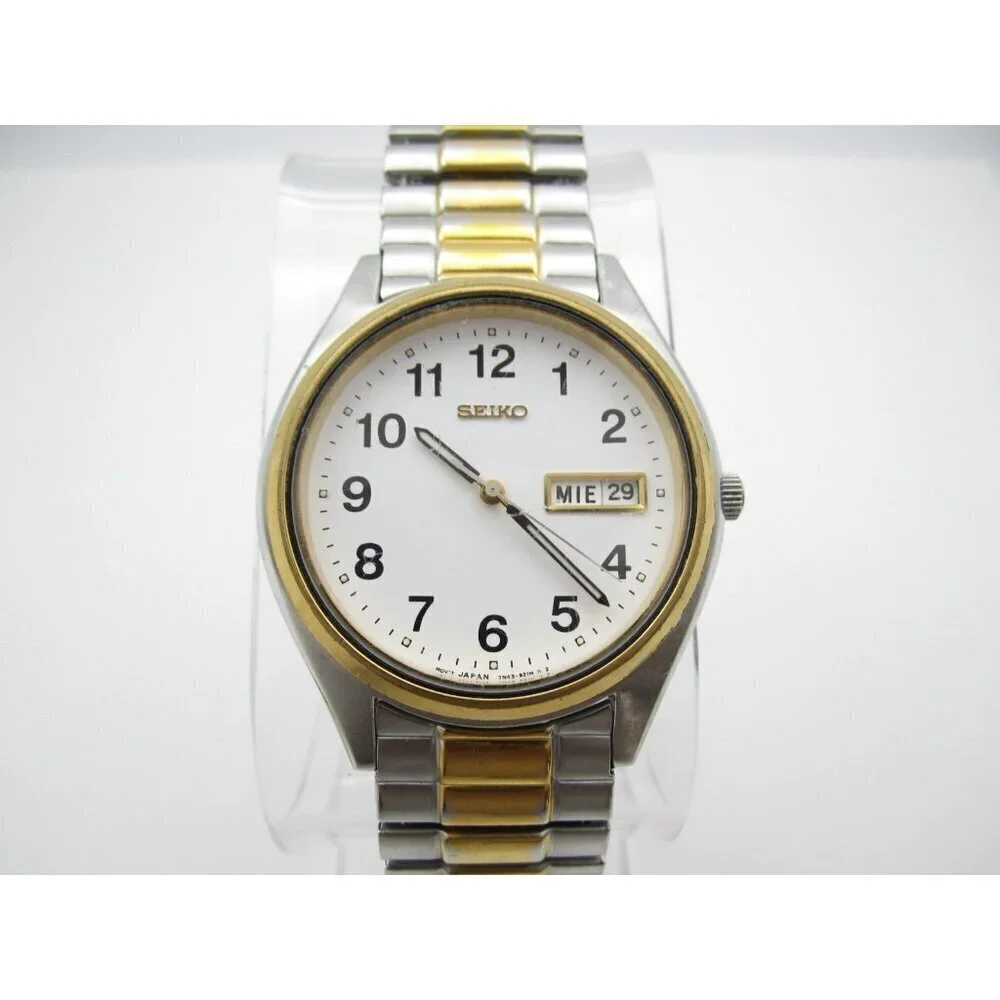 Vtg‎ Men Seiko Quartz WR Analog 35mm Day Date Round Watch (H773) 